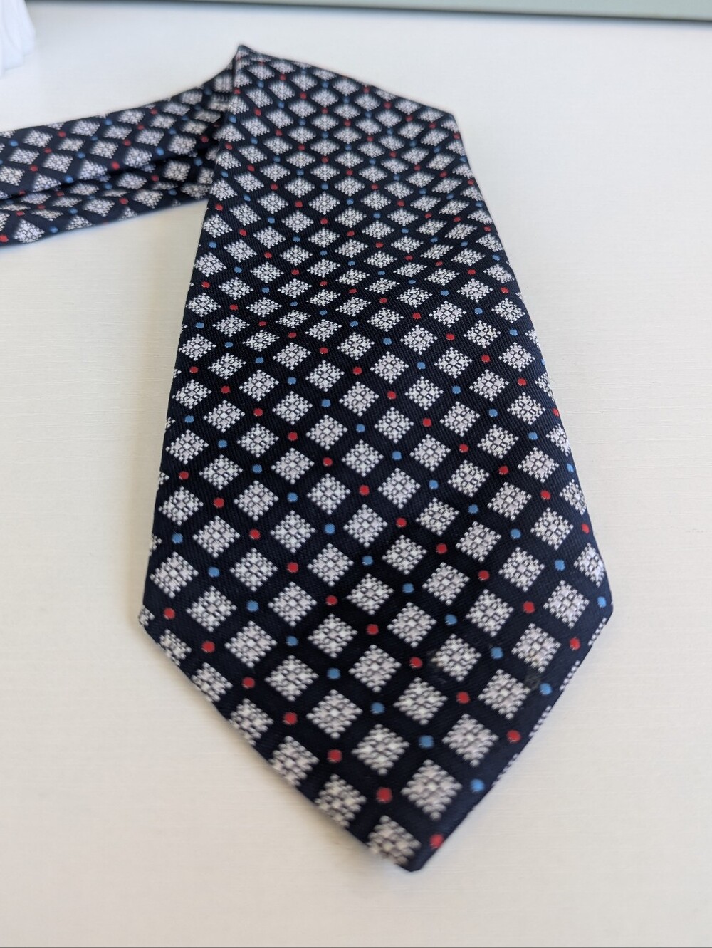 Dior Navy Tie with White Diamond Motif and Red Dots